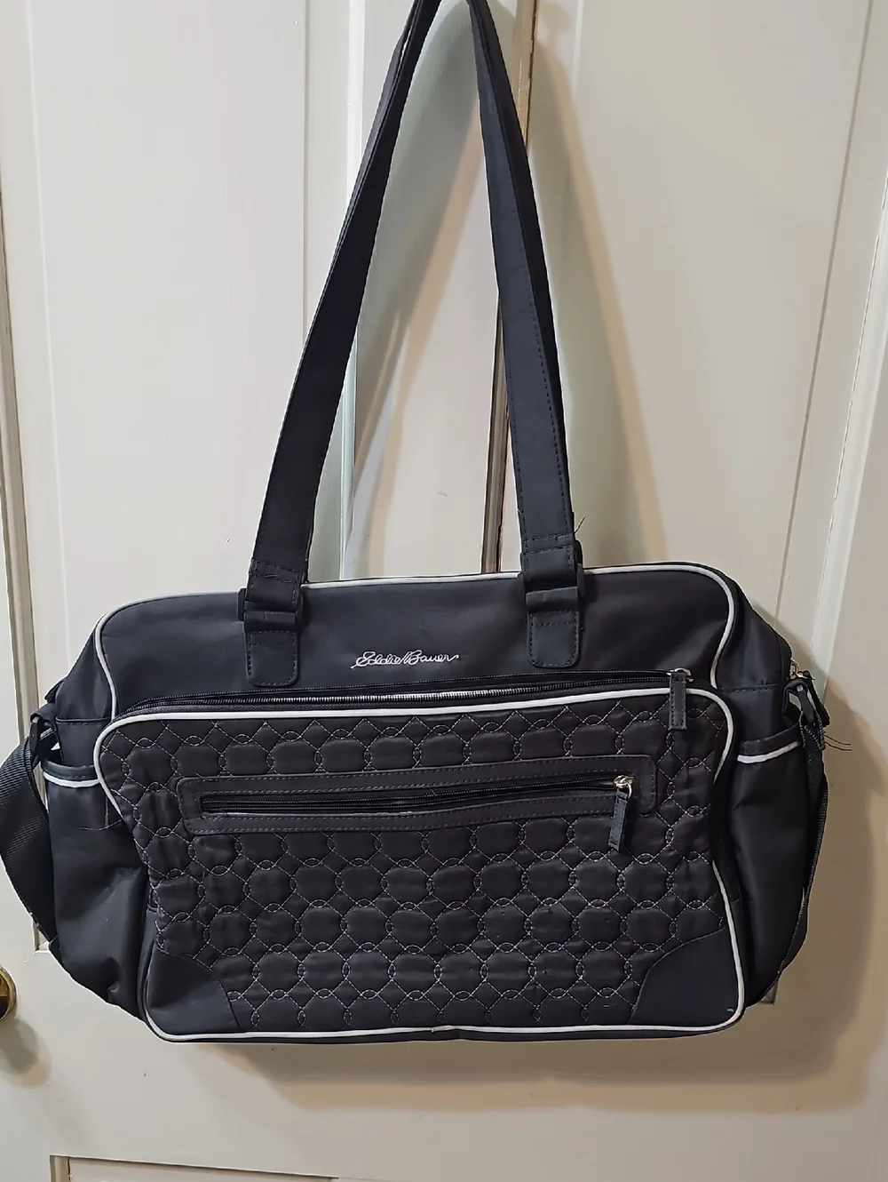 Eddie Bauer Black Quilted Baby Bag with White Piping